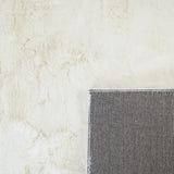 Onderkant KNUFFEL vloerkleed – geweven canvas backing detail ivoor wit