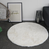 Rond fluffy vloerkleed ivoor wit – sfeerfoto in interieur