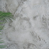 Zijkant detail KNUFFEL vloerkleed – 30 mm dikke pool en fluffy afwerking boven