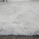 Zijkant detail KNUFFEL vloerkleed – 30 mm dikke pool en fluffy afwerking