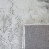 Onderkant KNUFFEL vloerkleed – geweven canvas backing detail lichtgrijs