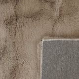 Onderkant KNUFFEL vloerkleed – geweven canvas backing detail licht taupe